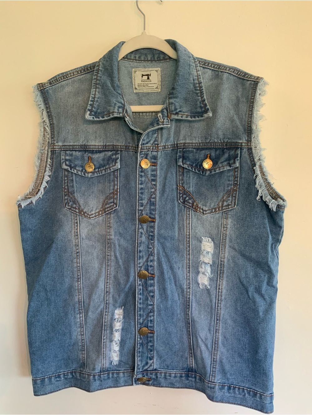 Fashion Art of Cowboy Vintage Distressed Faded Blue Denim Vest